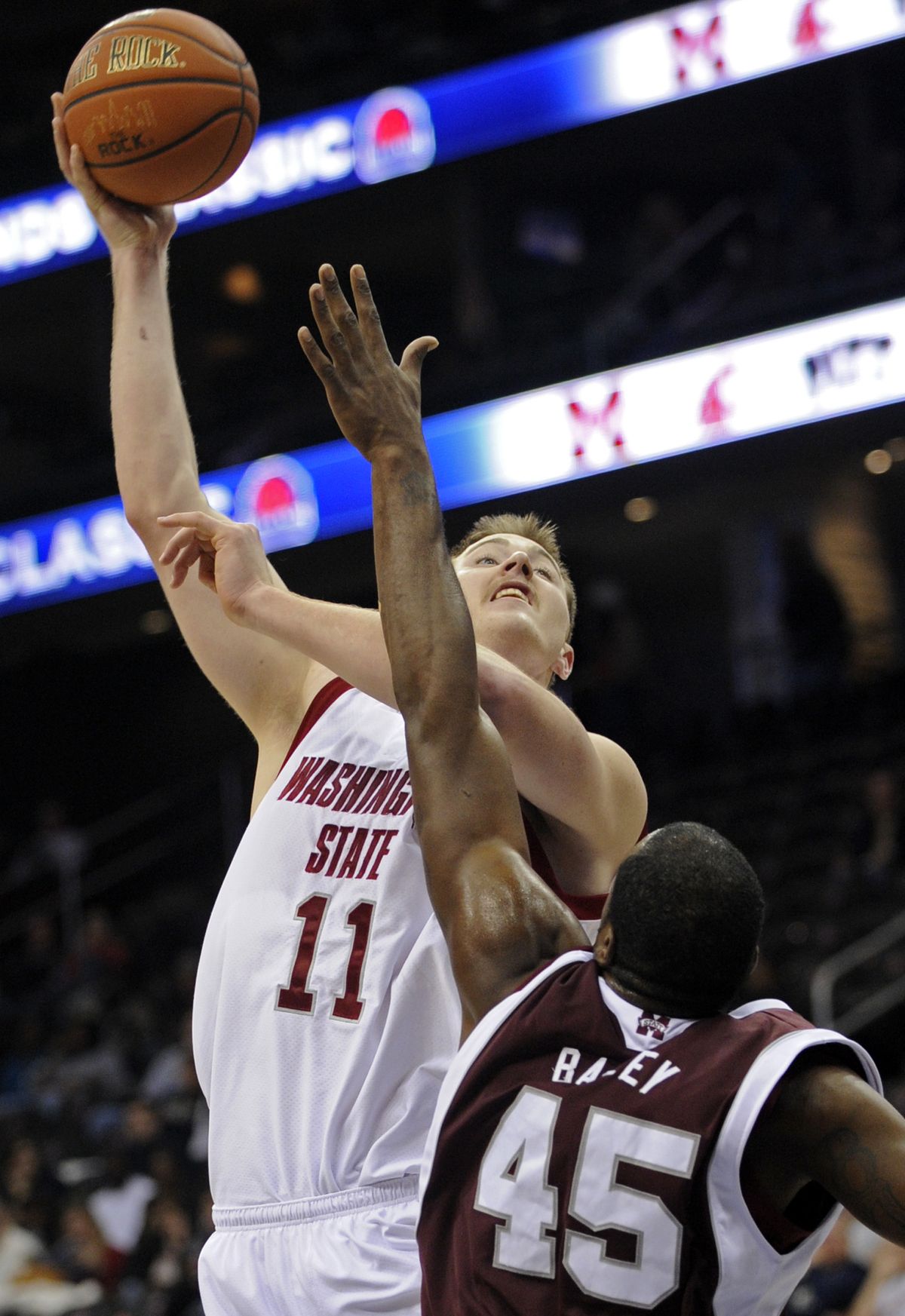WSU’s Aron Baynes, shooting over Elgin Bailey, finished with 17 points on 8-of-10 shooting.  (Associated Press / The Spokesman-Review)