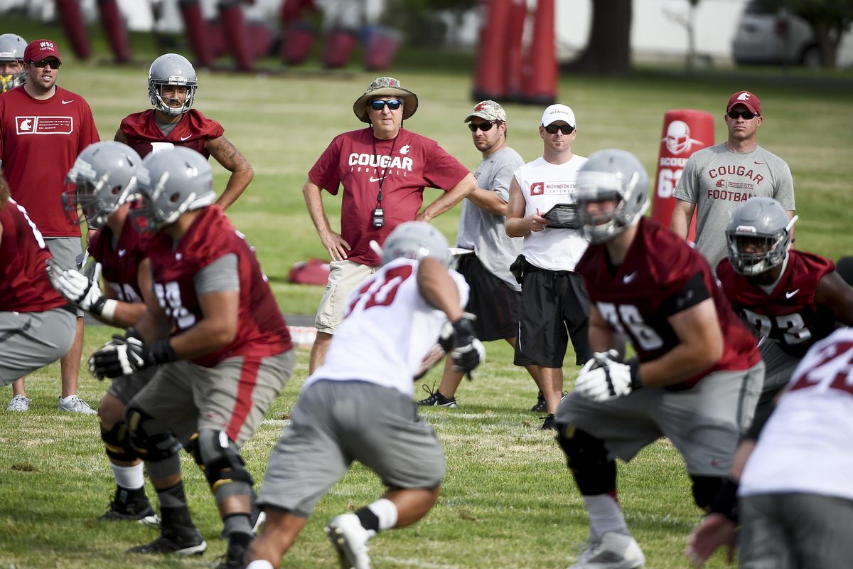 WSU head coach Mike Leach watches his team during practice on Saturday in Lewiston. (Tyler Tjomsland / The Spokesman-Review)