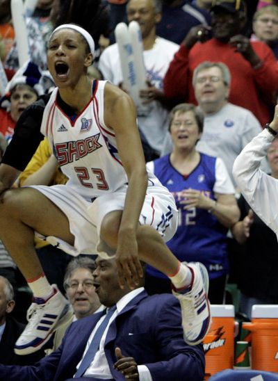 The Shock’s Plenette Pierson celebrates sweeping San Antonio. (Associated Press / The Spokesman-Review)