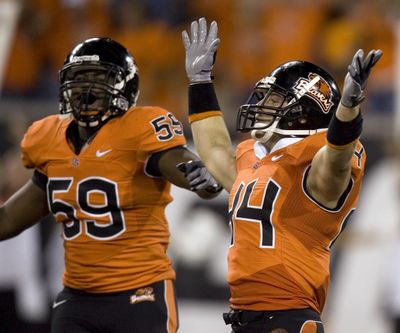 Oregon State defenders Dwight Roberson, left, and Greg Laybourn will be hunting for WSU turnovers on Saturday.  (Associated Press / The Spokesman-Review)