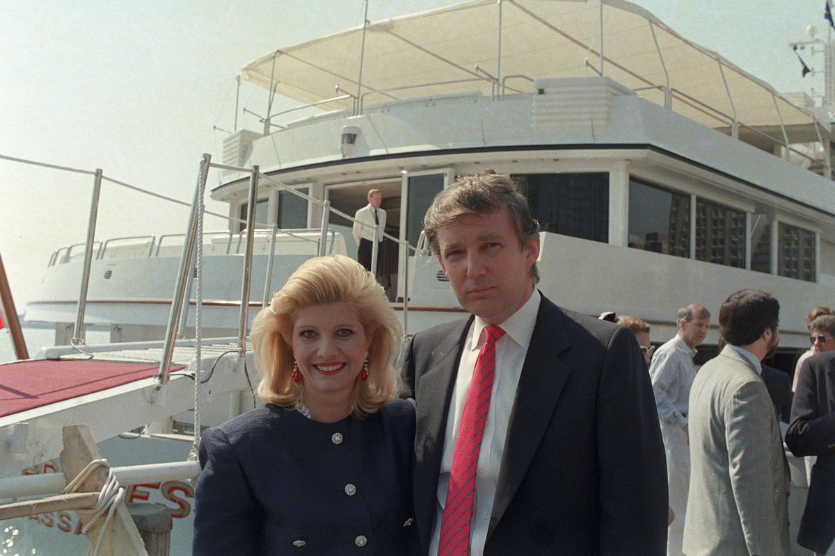 In this file photo dated Monday, July 4, 1988, U.S. real estate developer Donald Trump and his then-wife, Ivana, pose with their new luxury yacht The Trump Princess docked at the 30th Street pier on the East River in New York City. (Marty Lederhandler / Associated Press)