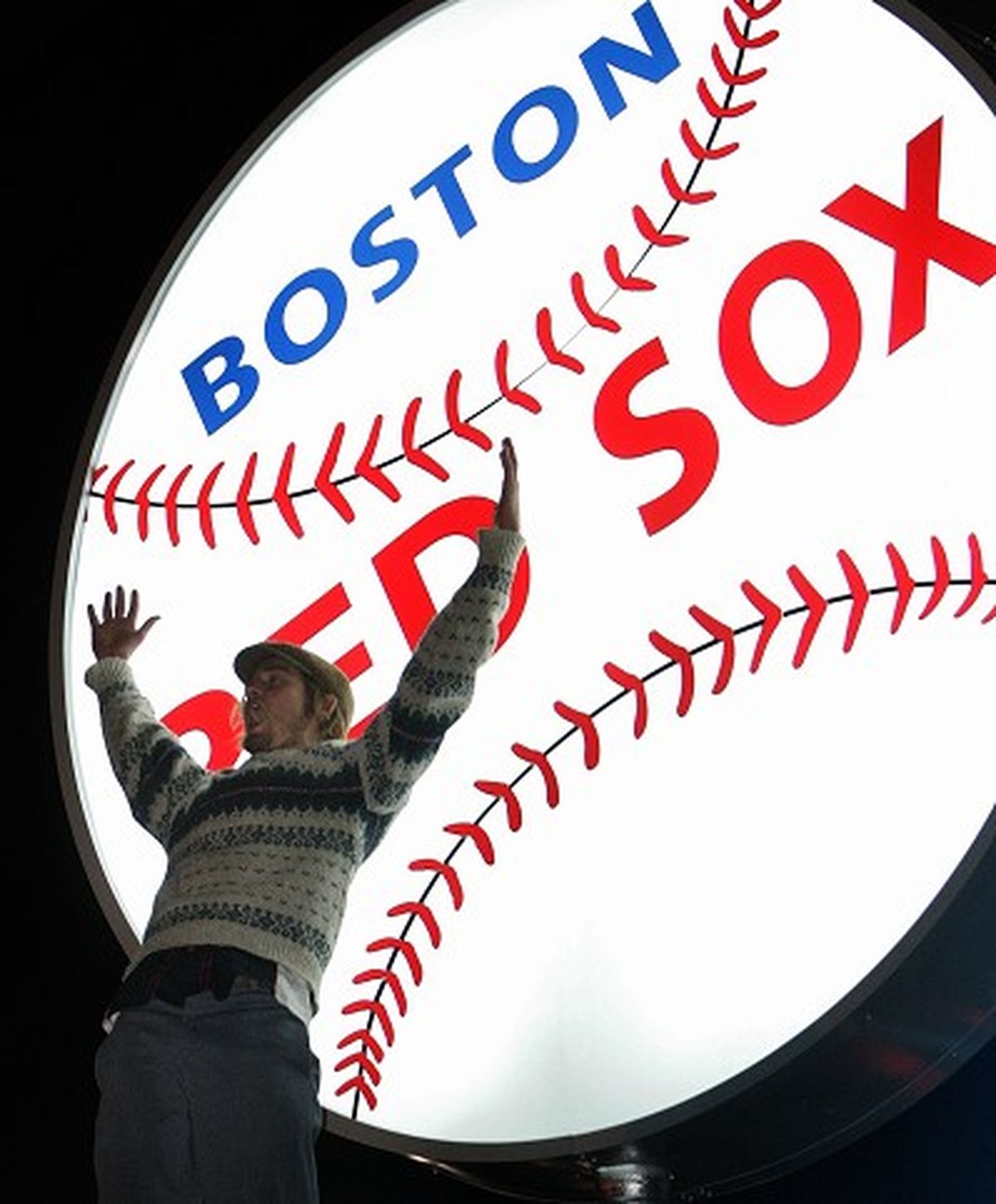 Boston Red Sox manager Terry Francona holds the World Series trophy after  the World Series game four at Coors Field in Denver on October 28, 2007.  The Boston Red Sox beat the