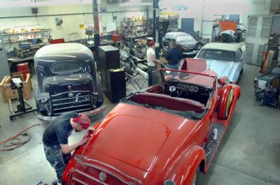 
In Glenn Vaughn's crowded shop in Post Falls, vintage, classic and muscle cars sit side by side while being repaired or restored. 
 (Jesse Tinsley Photos / The Spokesman-Review)
