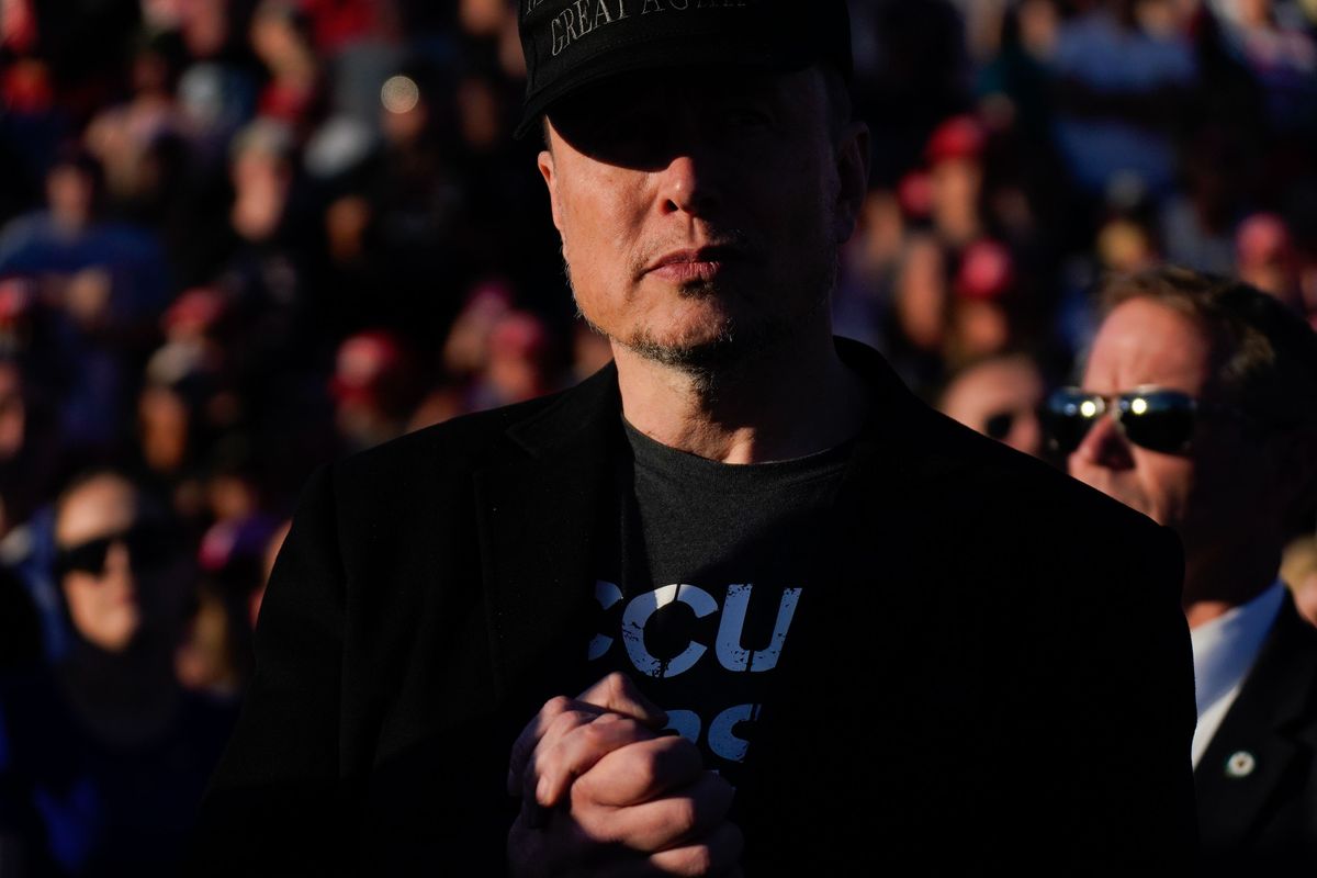 Elon Musk appears at a Donald Trump campaign event at the Butler Farm Show on Oct. 5 in Pennsylvania. (Jabin Botsford/The Washington Post)