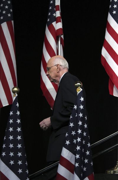 U.S. Sen. Bob Bennett leaves the stage  Saturday at the GOP convention in Salt Lake City.  (Associated Press)