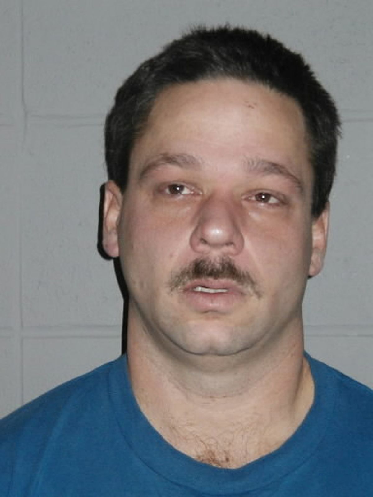 David Earl Burgert, a member of Kalispell, Mont militia group, pictured after an arrest in Feb. 2002.  (Associated Press)