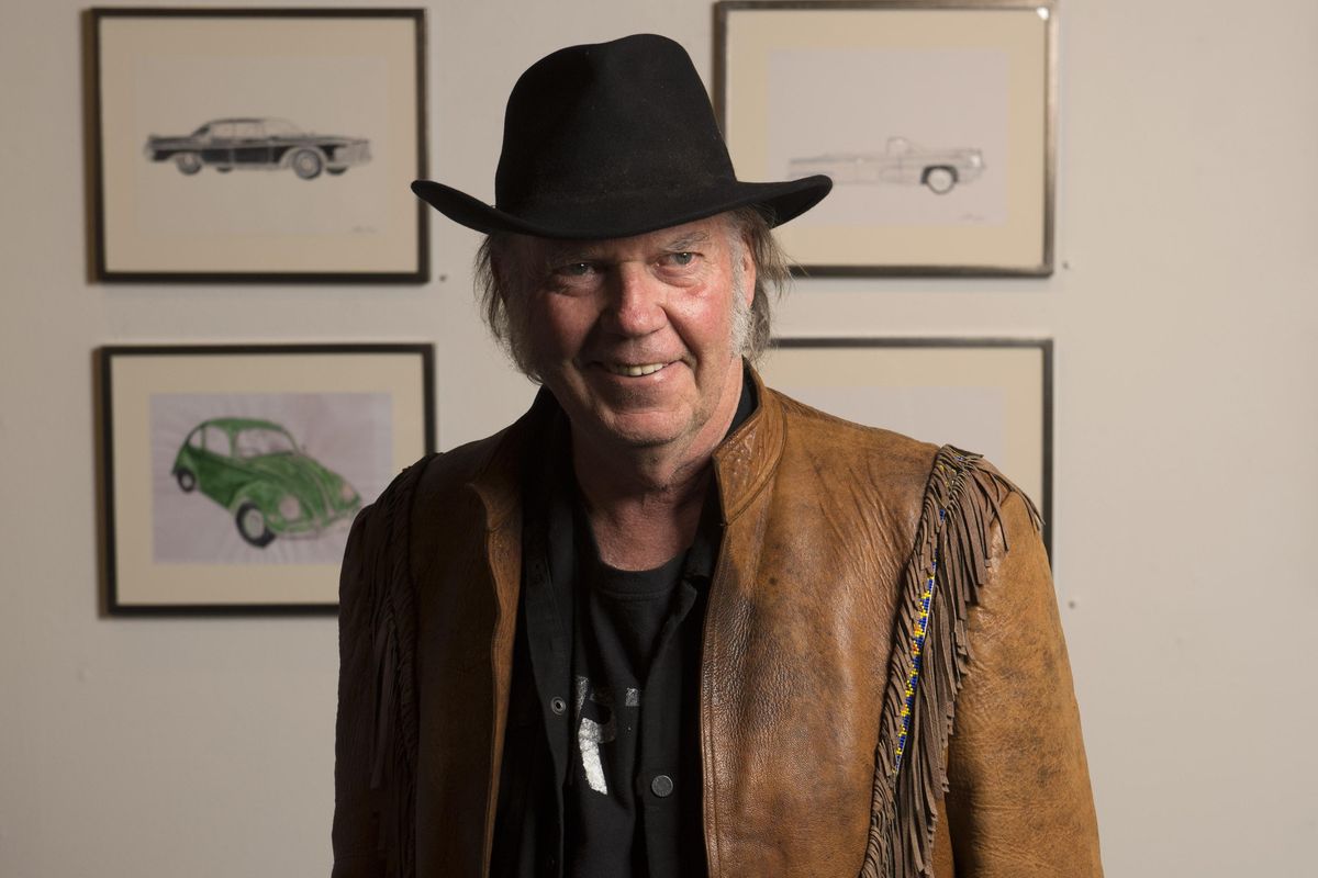 Neil Young performs Friday at Spokane Arena. (File Associated Press)