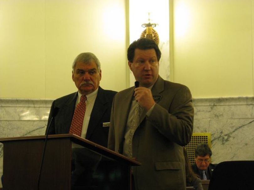 Sen. John Goedde, left, and Rep. Cliff Bayer, right, present the Legislature's Economic Outlook & Revenue Projection Committee's estimates of tax revenues to the joint budget committee on Friday. (Betsy Russell)
