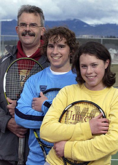 
The Steeles make their mark on tennis at University High School. From left, Rod Steele is the assistant boys coach, his son, Josh Steele, is the No. 1 singles player, and his daughter, Jessica Steele, is a freshman playing on the varsity team. 
 (Liz Kishimoto / The Spokesman-Review)