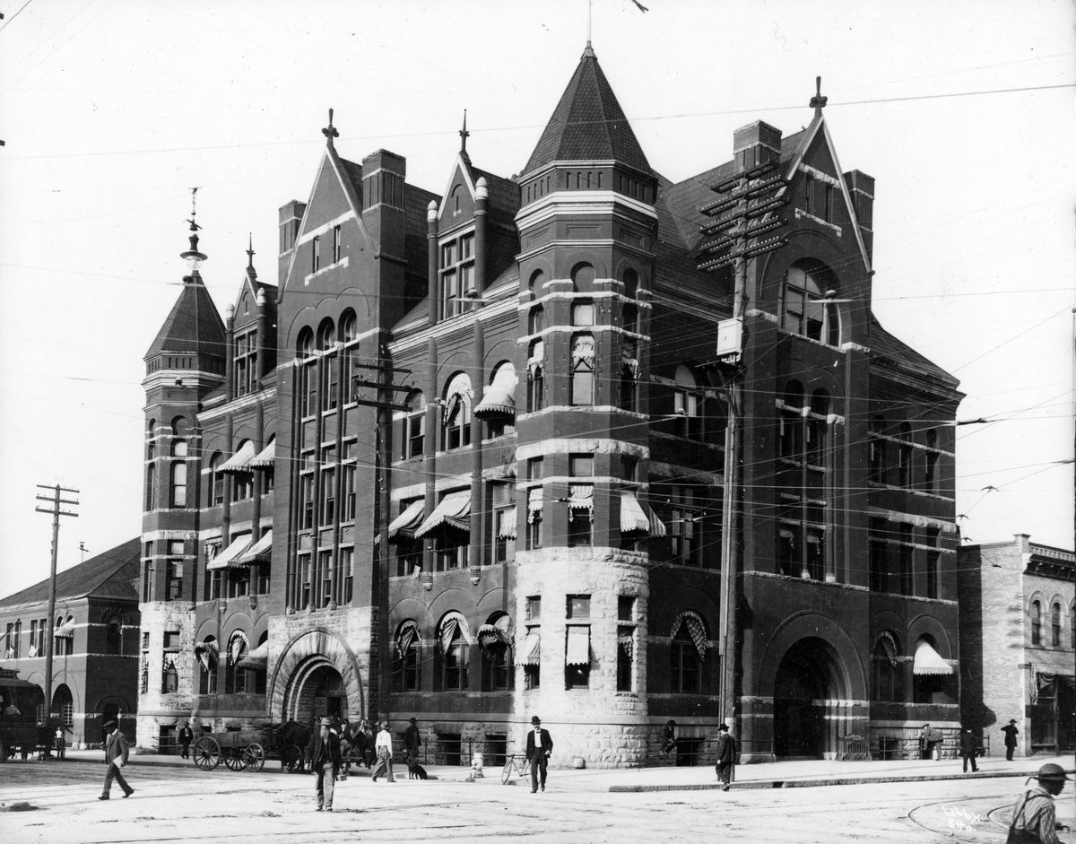 The impressive city hall was built at the corner of Howard and Front St. in 1894, a symbol of Spokane’s prosperity and prestige. Farther east on the block was a row of Chinese mercantile shops and a boardinghouse called the Ondawa Inn, opened in 1903. (COURTESY OF THE NORTHWEST ROOM, SPOKANE PUBLIC LIBRARY / SR)