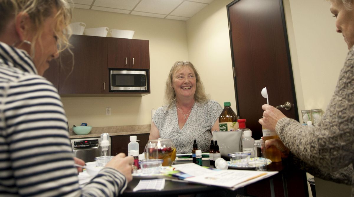 Sandy Falkner of Young Living Essential Oils leads an essential oils demonstration in Spokane Valley last month. (Kathy Plonka / The Spokesman-Review)