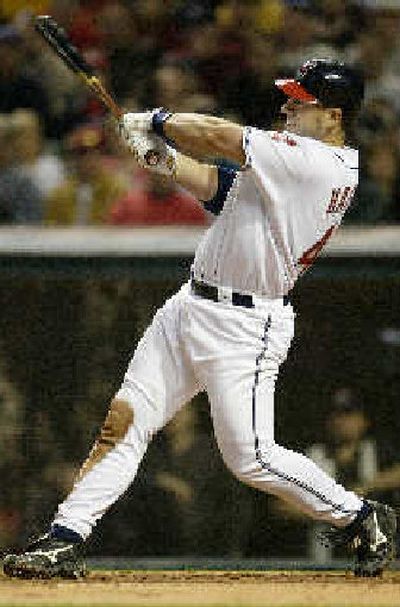 
Cleveland's Travis Hafner connects for a fifth-inning solo home run.
 (Associated Press / The Spokesman-Review)