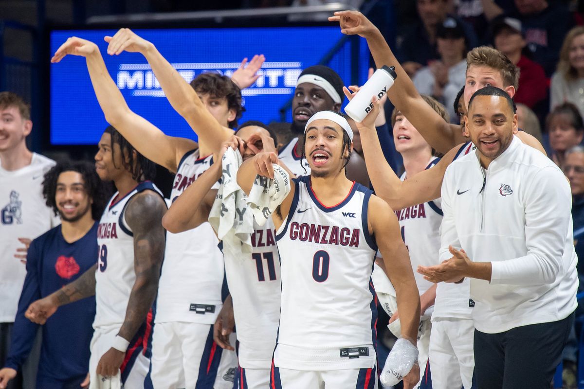 With the benchwarmers on the court, the starters cheer a Gonzaga center Ismaila Diagne (24) score late the second half of a NCAA college basketball game with UMass Lowell, Friday, Nov. 15, 2024, at the McCarthey Athletic Center.  (COLIN MULVANY)