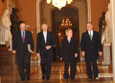 
From left, Sen. Charles Schumer, D-N.Y.,  Sen. Harry Reid, D-Nev., Sen. Patty Murray, D-Wash., and Sen. Richard Durbin, D-Ill., emerge from a Democratic caucus Tuesday on Capitol Hill in Washington. 
 (Associated Press / The Spokesman-Review)
