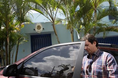 Venezuelan Embassy charge d’affairs Ariel Vargas gets into his car outside the Venezuela Embassy in Tegucigalpa, Honduras, on Tuesday.  (Associated Press / The Spokesman-Review)