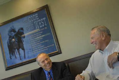 
Businessman Jack Pring, right, and Korean War National Museum director Larry Sassorossi talk Tuesday in Pring's Spokane Valley office. 
 (Brian Plonka / The Spokesman-Review)