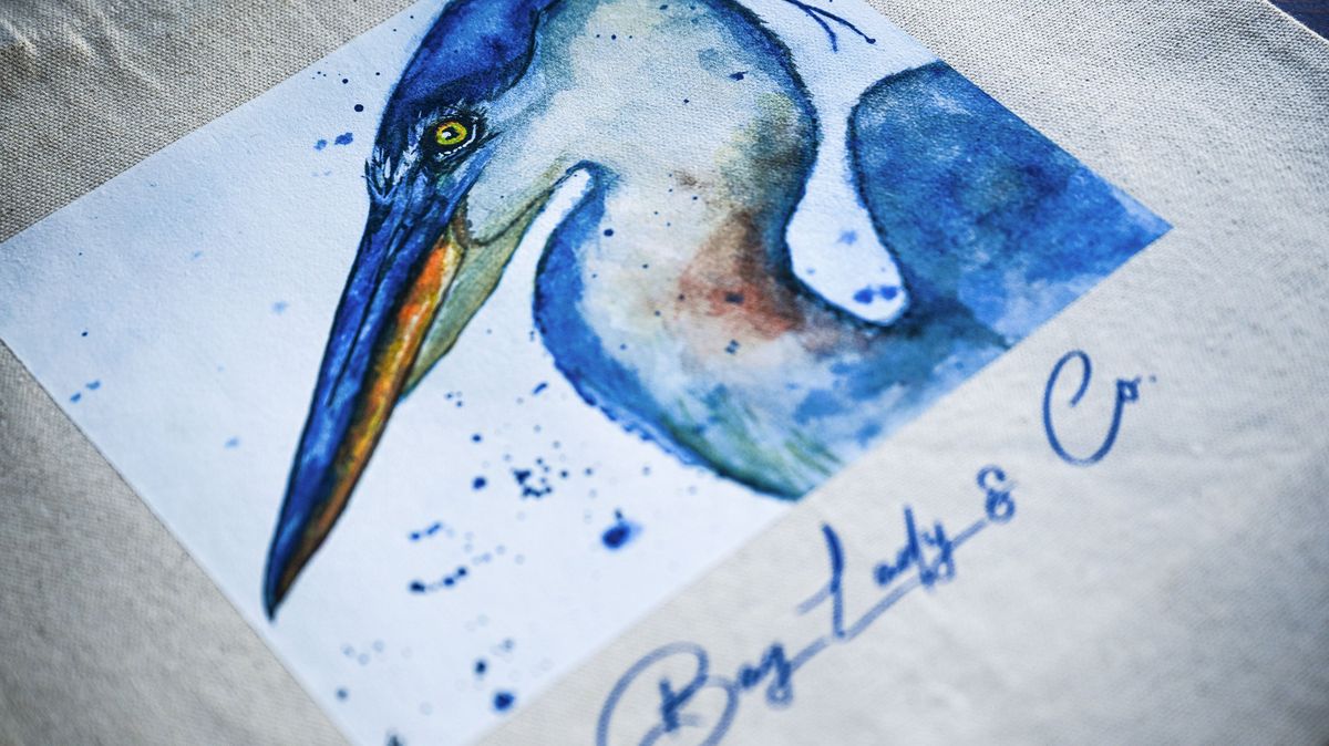 Faye Griffiths Great blue heron bag and apron is now for sale at Made with Love Bakery in Spokane on Tuesday, April 7, 2026. (Kathy Plonka/The Spokesman-Review)