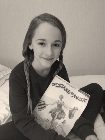Sophia Anne Caruso holds her copy of the original Broadway musical score of 