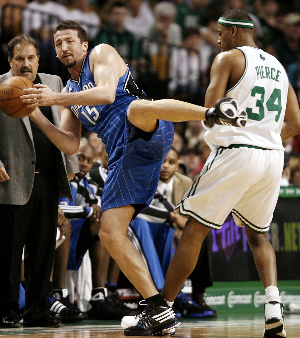 Hedo Turkoglu looks to pass while Boston’s Paul Pierce defends during the Magic’s win March 8. (Associated Press / The Spokesman-Review)