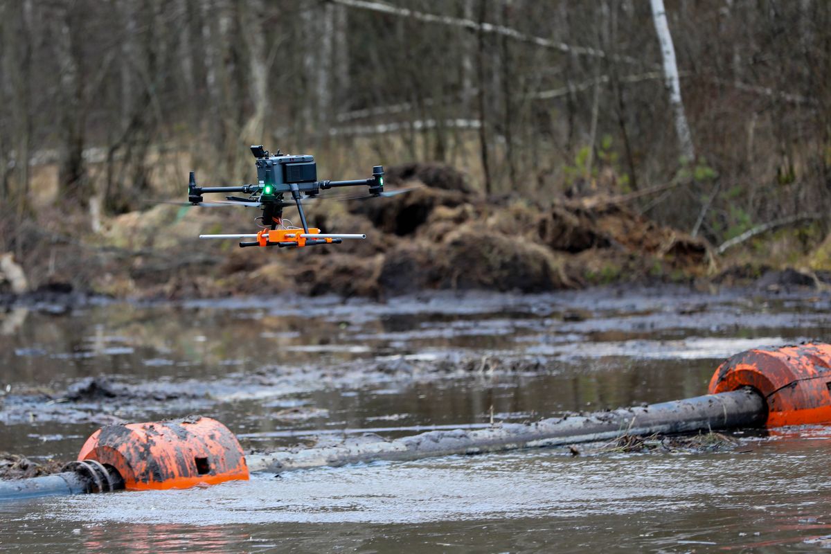 A drone with ground-penetrating radar scans the bog where four U.S. soldiers’ bodies were found. (Staff Sgt. Rose Di Trolio/70th Mobile Public Affairs Detachment)