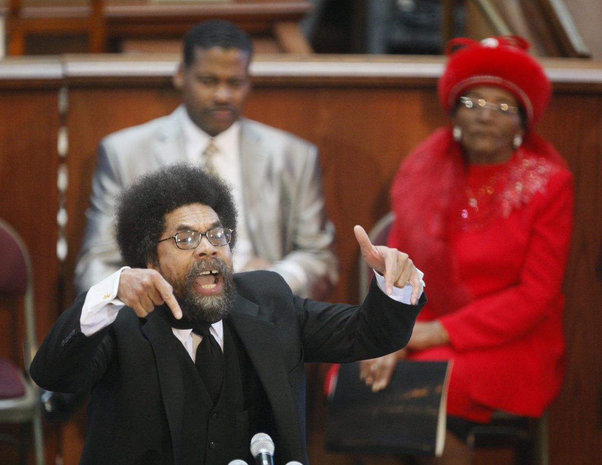 Keynote speaker Cornel West gestures as he speaks during the Martin Luther King Jr. commemorative service at Ebenezer Baptist Church on Monday in Atlanta. Associated Press photos (Associated Press photos)