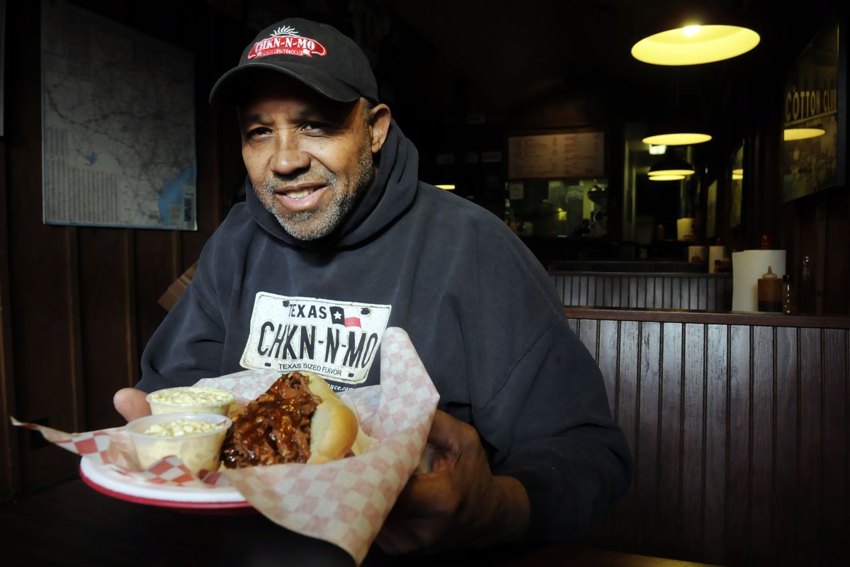 Bob Hemphill, holding a barbecue beef sandwich and side dishes, believes that treating customers well is important if you want to make it in the restaurant business. “Gotta give them a reason to come back,” said the owner of Chicken-n-More.jesset@spokesman.com (Jesse Tinsley)