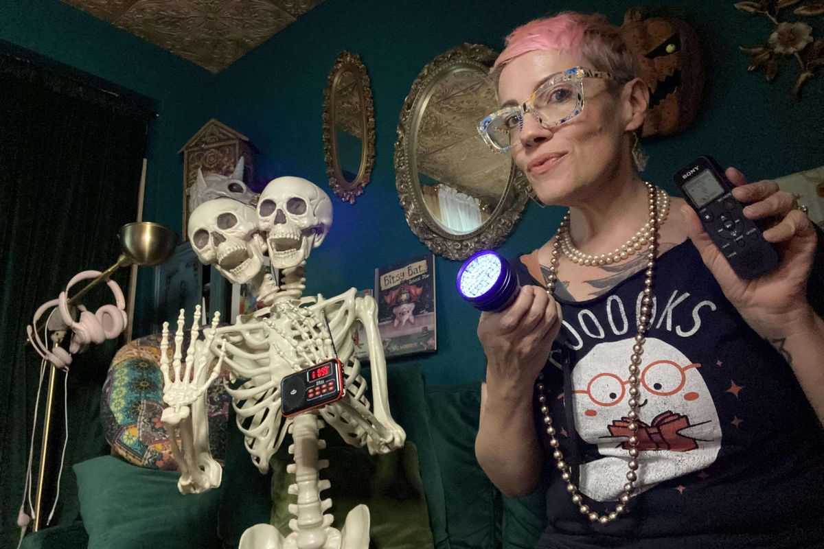 Kaz Windness tries out her library’s ghost-hunting kit in her office in Thornton, Colo., this month.  (Courtesy of Kaz Windness)