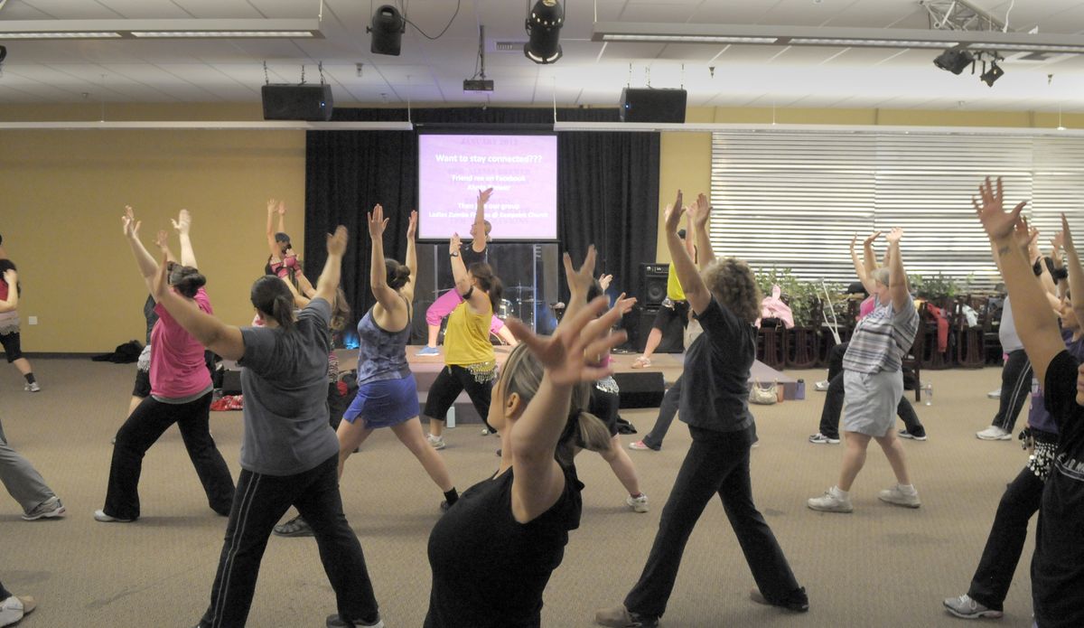 Alysia Brewer, rear center, leads a Zumba exercise class at Eastpoint Church in Spokane Valley Tuesday. (Christopher Anderson)