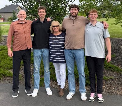 Randy and Tara Groves stand with their three sons – Jacob (second from left), Tanner (fourth from left) and Dylynn (far right). Dylynn graduated from Gonzaga Prep last Spring and is committed to play basketball at Idaho.  (Courtesy of the Groves family)