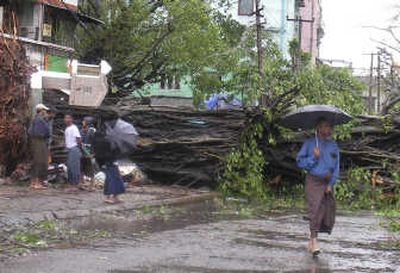 
Fallen trees obstruct a street in Yangon, Myanmar, on Sunday in the aftermath of a deadly cyclone. Associated Press
 (Associated Press / The Spokesman-Review)