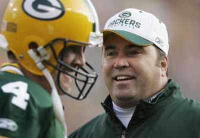 Packers coach Mike McCarthy, right, and Brett Favre share a laugh. Associated Press
 (Associated Press / The Spokesman-Review)
