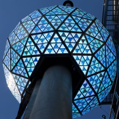 The Times Square New Year's Eve Ball rises to the top of it's 135 foot spire, Friday, Dec. 30, 2011, in New York. A crowd cheered as the ball dropped in a dress rehearsal around noon Friday as preparations continued for New York's big welcome party for 2012. (John Minchillo / Fr170537 Ap)