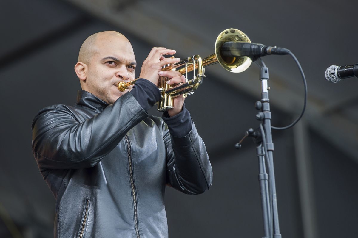 FILE - In this May 4, 2017 file photo, Irvin Mayfield performs at the New Orleans Jazz and Heritage Festival in New Orleans. Mayfield, the jazz trumpet player who became a symbol of New Orleans resilience after Hurricane Katrina, was scheduled to be sentenced in federal court Wednesday, Nov. 3, 2021, for steering charity money meant for public libraries to his personal use.  (Amy Harris)