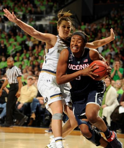 UConn’s Morgan Tuck looks to score on ND’s Kathryn Westbeld. (Associated Press)