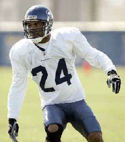 
Seahawks cornerback Bobby Taylor has been slowed by a sore knee at camp. 
 (Associated Press / The Spokesman-Review)