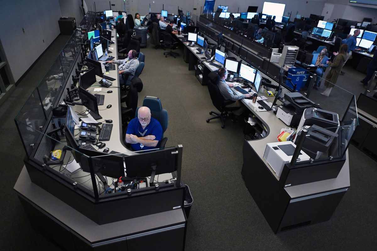 Workers are seen at an FAA Air Traffic Control command center in Warrenton, Va.  (Matt McClain/The Washington Post)