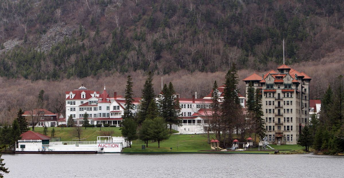 FILE- This May 10, 2012, file photo shows The Balsams grand hotel in Dixeville Notch, N.H.  An auction is set for Saturday, Sept. 22, 2012, to clear out the nearly 150-year-old resort. The resort was sold last year to two businessmen for $2.3 million. They plan to reopen it in 2013. Andy Martin, who has run for U.S. Senate in Illinois and twice run for president of the United States, is trying, in September 2012, to get a New Hampshire judge to undo the sale of The Balsams and appoint a receiver to reopen it immediately. (Jim Cole / Associated Press)