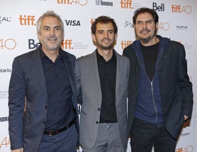 Alfonso Cuaron, Jonas Cuaron and Carlos Cuaron attend Toronto International Film Festival on Sept. 13, 2015, in Toronto. (Tony Felgueiras / Invision/Associated Press)