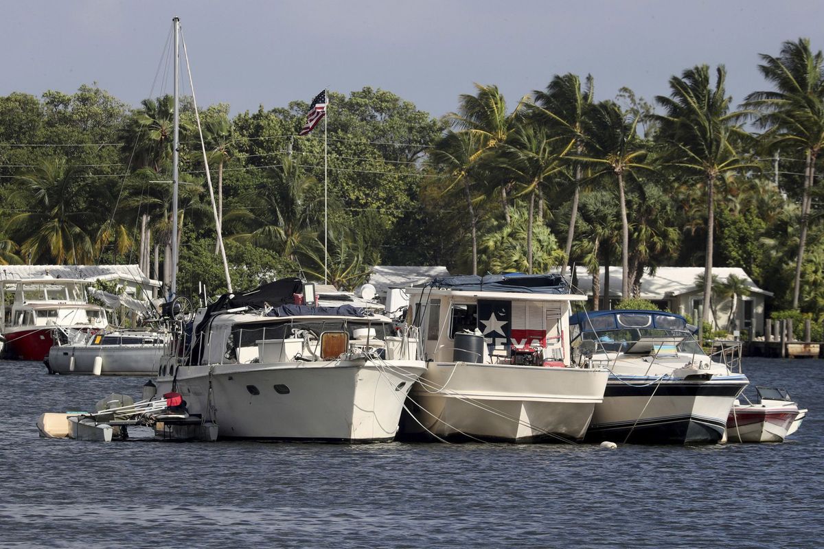 A group of boats near the Hollywood Marina remained anchored on North Lake in mid-December.  (Mike Stocker/South Florida Sun Sentinel/TNS)