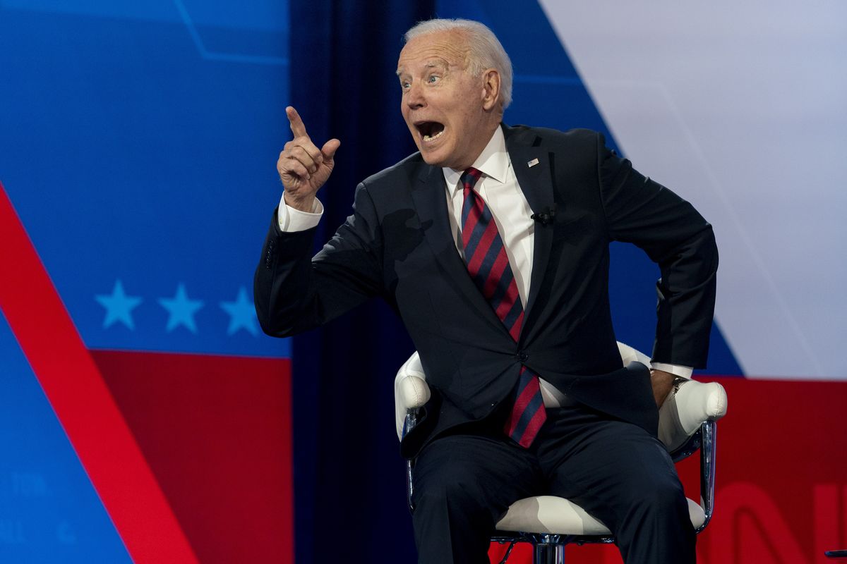 President Joe Biden interacts Wednesday with members of the audience during a commercial break for a CNN town hall at Mount St. Joseph University in Cincinnati.  (Andrew Harnik)