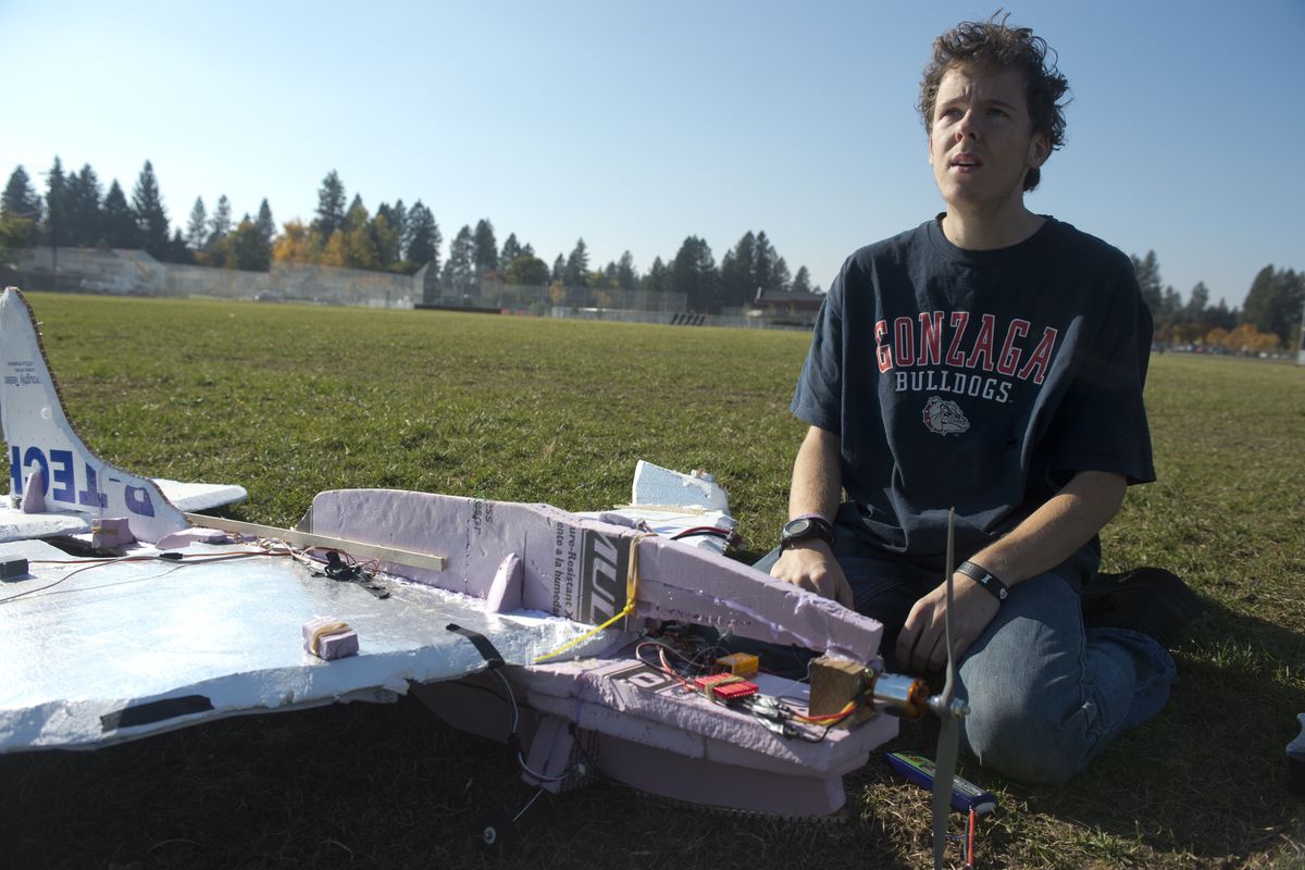 Paul Alex Rudy prepares to fly his makeshift radio control airplane at Hart Field on Oct. 17. (Jesse Tinsley)