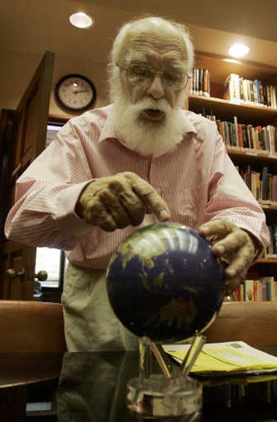 
James Randi, considered the grandfather of skeptics, points to his desktop globe at his home in Fort Lauderdale, Fla.Associated Press
 (Associated Press / The Spokesman-Review)