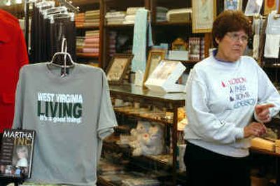 
Betty Alderson talks Thursday in Alderson, W.Va., about the excitement in the town about Martha Stewart's imprisonment at the Alderson Federal Prison Camp. Alderson is selling Stewart related t-shirts and books. 
 (Associated Press / The Spokesman-Review)