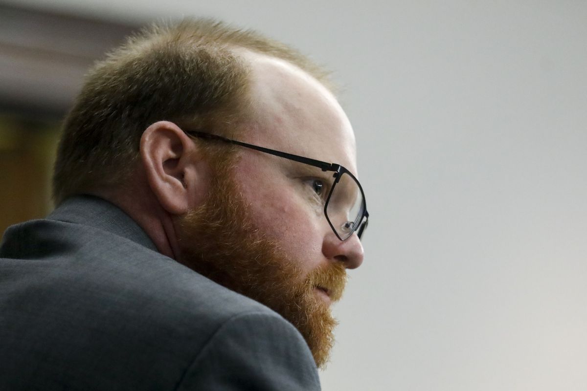 Defendant Travis McMichael looks on during during his trial at the Glynn County Courthouse, Friday, Nov. 19, 2021, in Brunswick, Ga. Greg McMichael and his son, Travis McMichael, and a neighbor, William "Roddie" Bryan are charged with the February 2020 slaying of 25-year-old Ahmaud Arbery.  (OCTAVIO JONES)