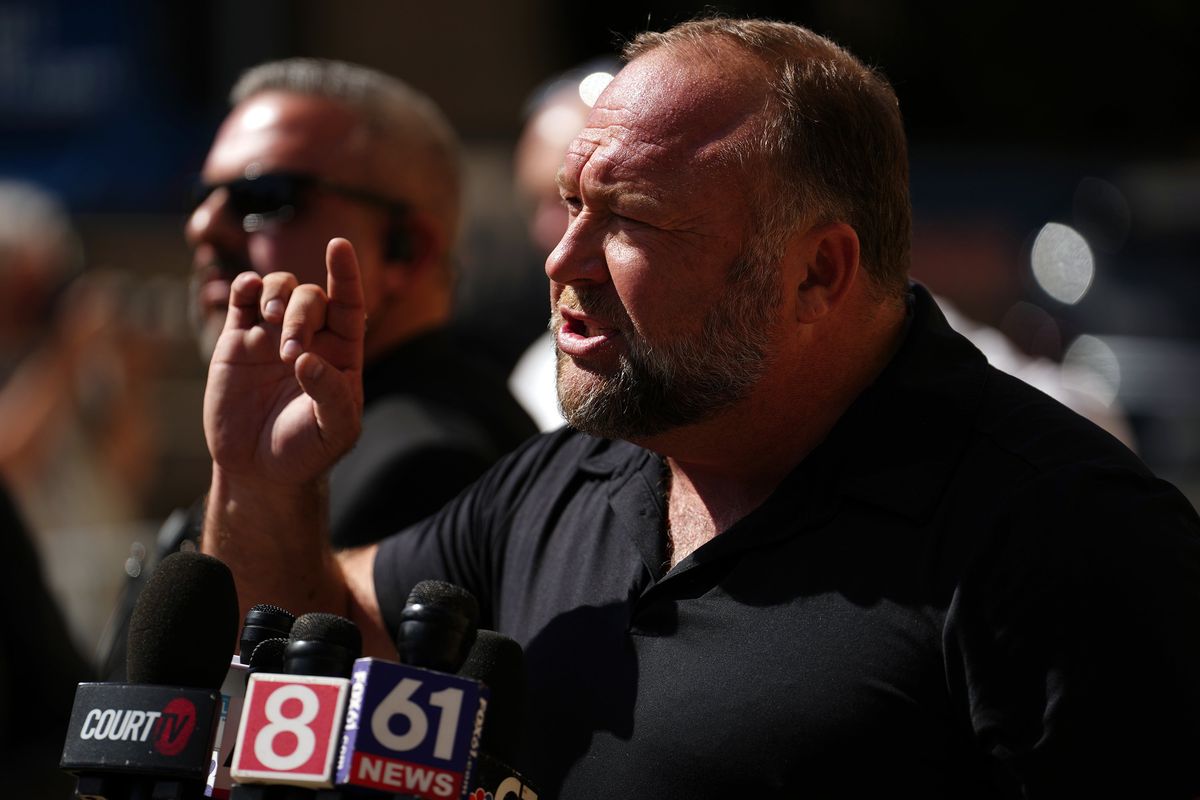 InfoWars founder Alex Jones speaks to the media outside Waterbury Superior Court during his trial on Sept. 21, 2022, in Waterbury, Connecticut.  (Joe Buglewicz/Getty Images North America/TNS)