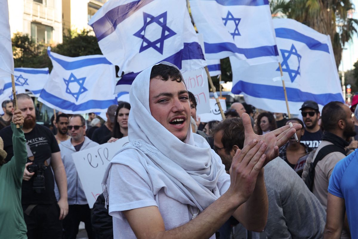 Israelis protest against the government’s controversial judicial reform bill in Tel Aviv on Thursday.  (Ahmad Gharabli/GETTY IMAGES EUROPE/TNS)