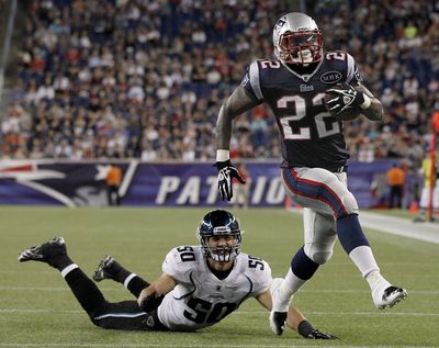 Patriots running back Stevan Ridley high-steps toward the end zone to score against Jacksonville. (Associated Press)