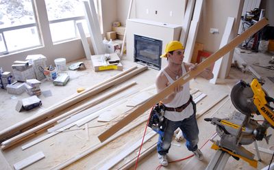 Joey Lombard  works on a Sullivan Homes house in Spokane Valley in February 2007.    (File / The Spokesman-Review)