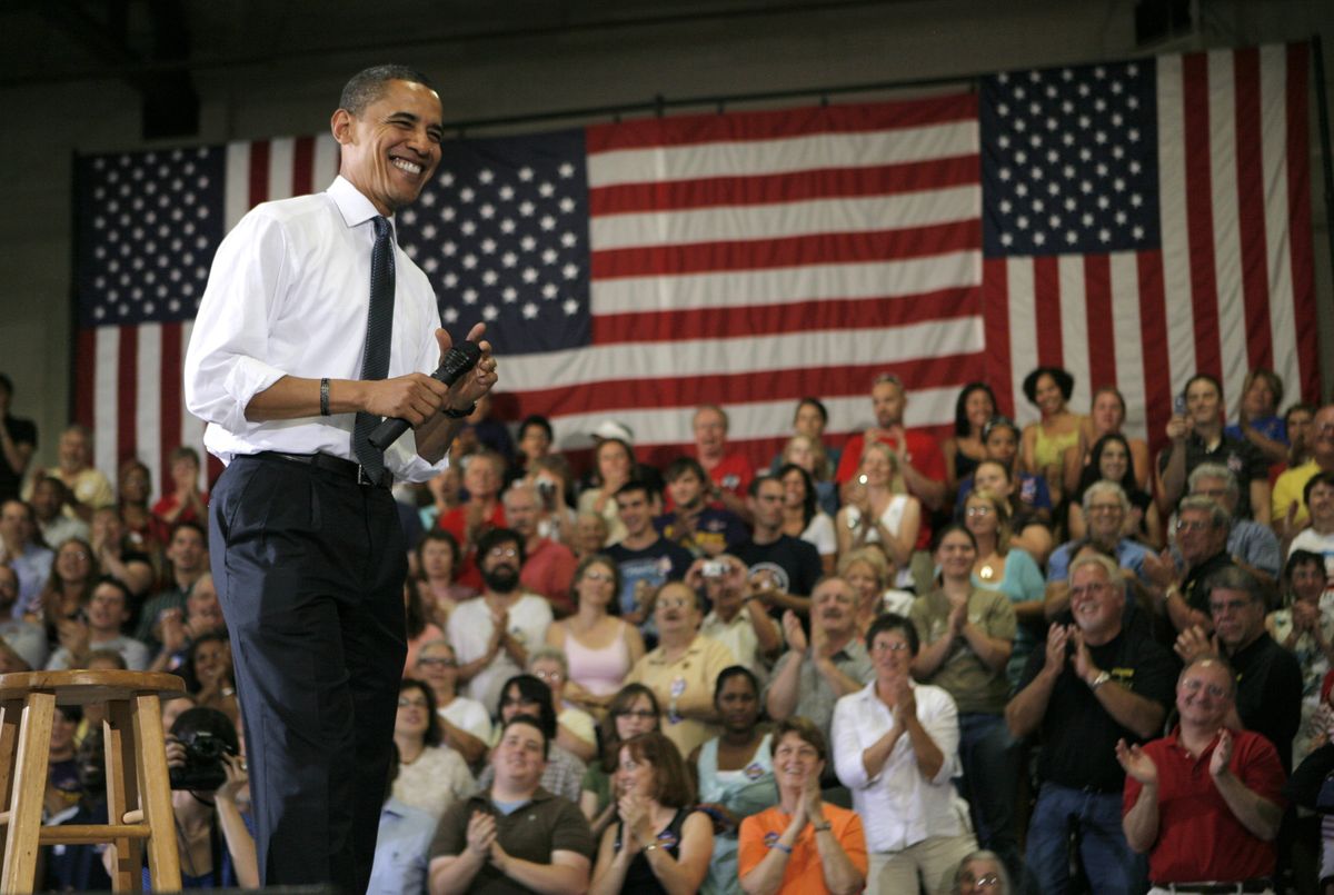 Sen. Barack Obama, D-Ill., smiles while speaking at a town hall-style meeting Thursday in Cedar Rapids, Iowa. Associated Press photos (Associated Press photos / The Spokesman-Review)