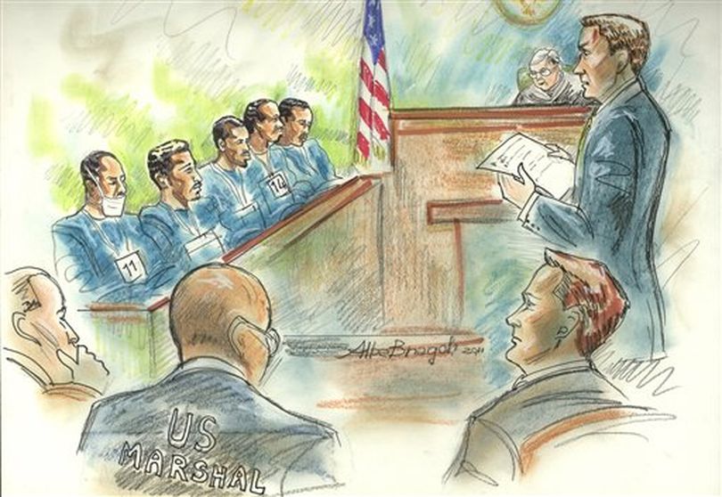 This courtroom sketch depicts the first appearance in federal court of some of the fourteen suspected pirates captured after four Americans were killed aboard a hijacked yacht in February, Thursday, March 10, 2011. in Norfolk, Va. At the top of the drawing is judge Tommy Miller, standing at right is prosecutor Ben Hatch and sitting at right is prosecutor Brian Samuels.  (Alba Bragoli / (AP Photo/The Virginian-Pilot, Alba Bragoli))